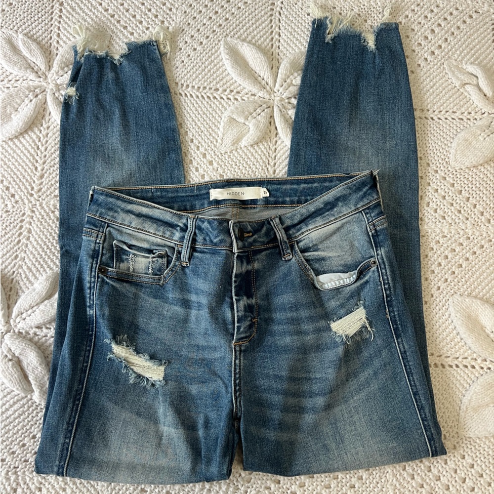Medium wash distressed skinny jeans